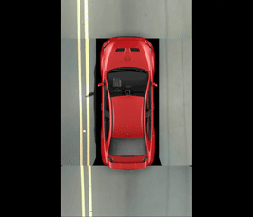 A top-down 360 view generated with BEV from the captures of 4 cameras attached to a car driving in the street